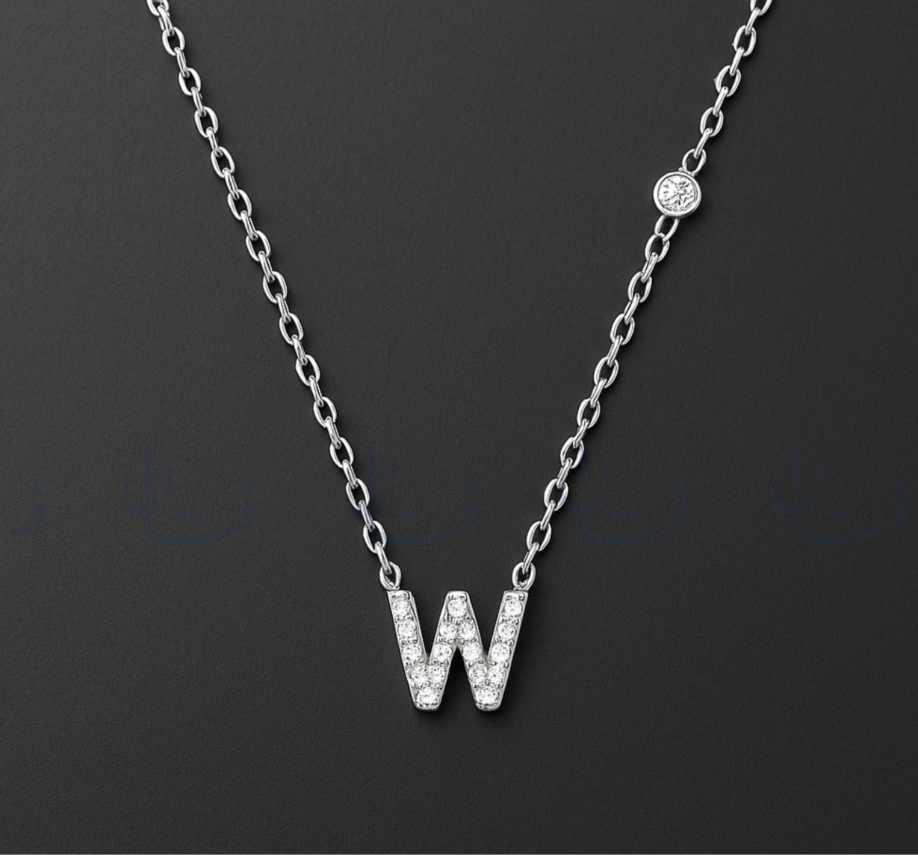 حرف W فضي